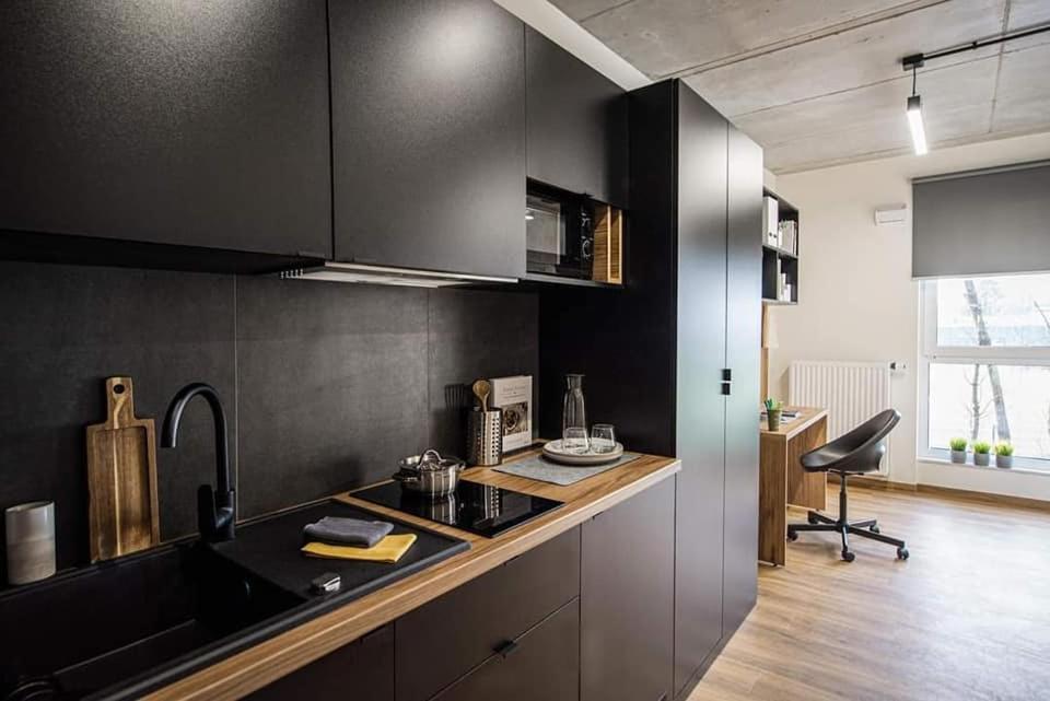 Shed Living Krakow Aparthotel Bagian luar foto